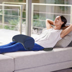 Shiatsu foot and calf massager with heat, enclosed chamber design, and digital controls in a modern home setting.