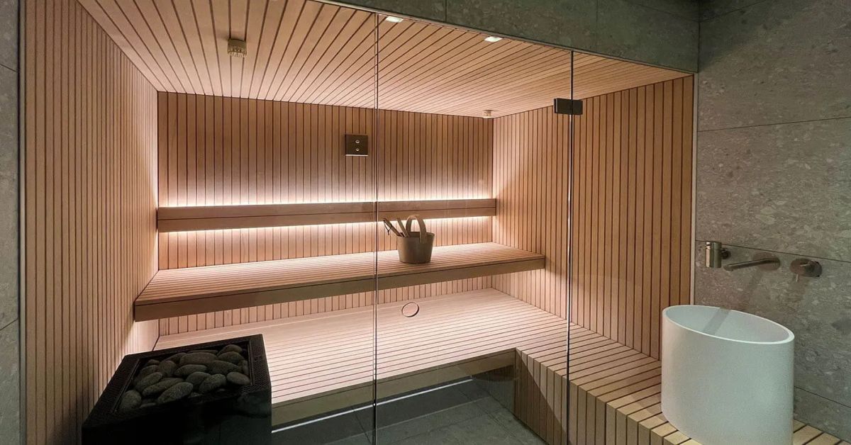 Lume & Timber luxury 1-person Canadian Hemlock far-infrared sauna interior with integrated therapeutic lighting.